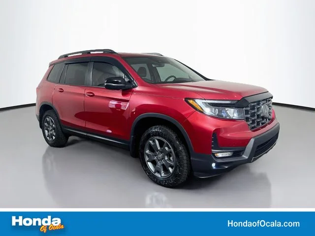 Certified Used 2025 Radiant Red Metallic II Honda AWD TRAILSPORT image 1