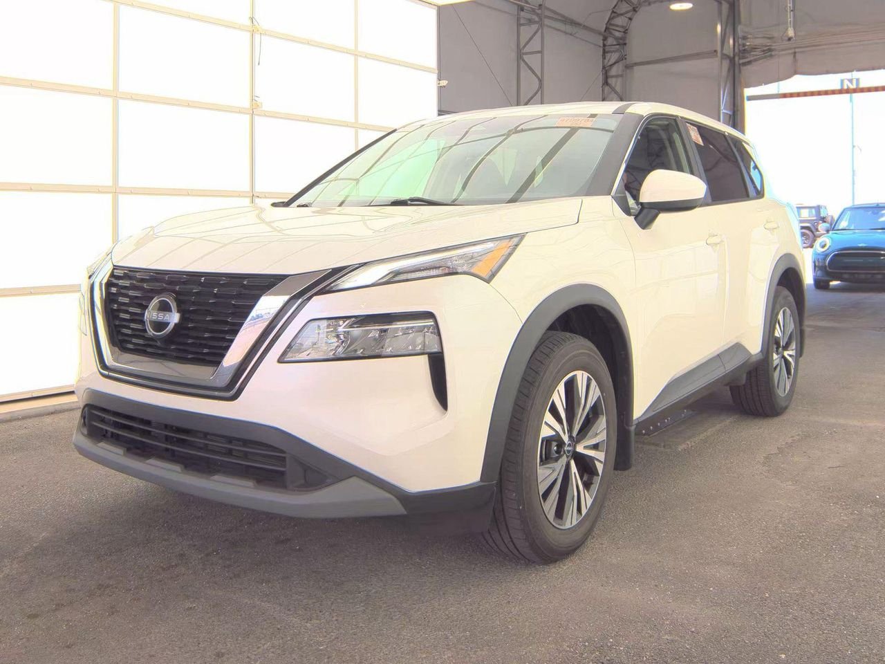 Used 2023 Pearl White Tricoat Nissan SV Intelligent AWD image 1