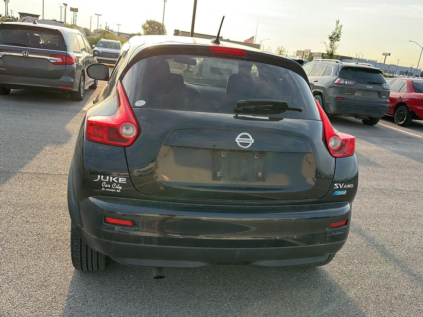Used 2013 Graphite Blue Nissan SV image 4