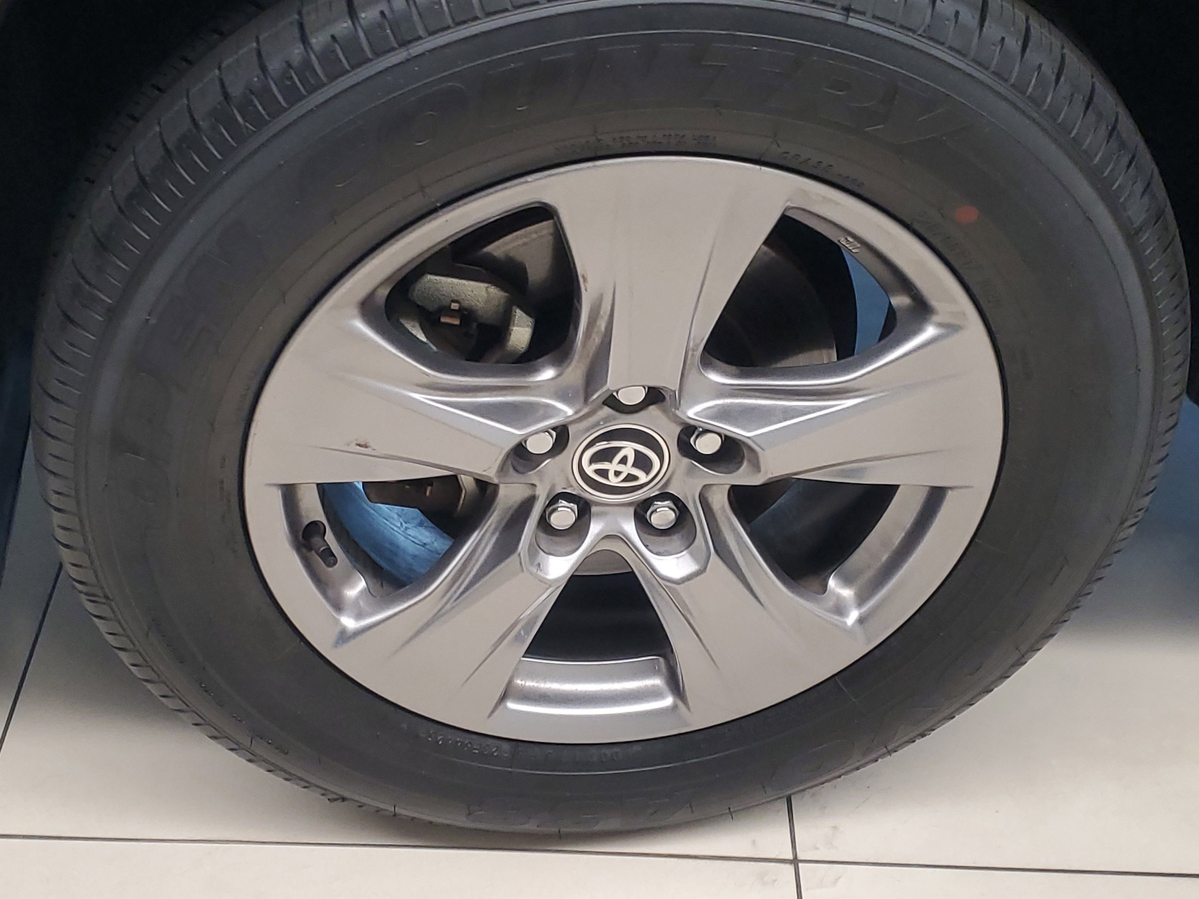Used 2024 Midnight Black Metallic Toyota Hybrid LE image 4