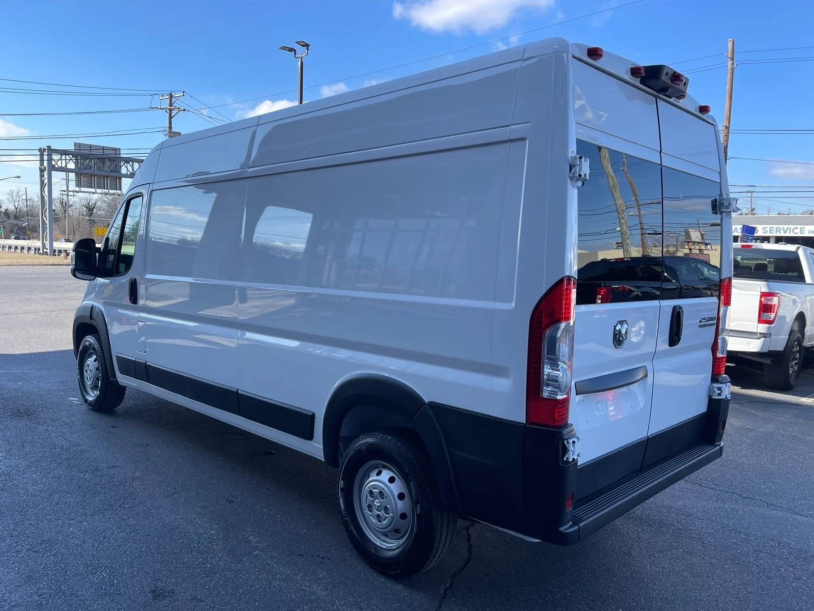 Used 2023 Bright White Clearcoat Ram High Roof image 5
