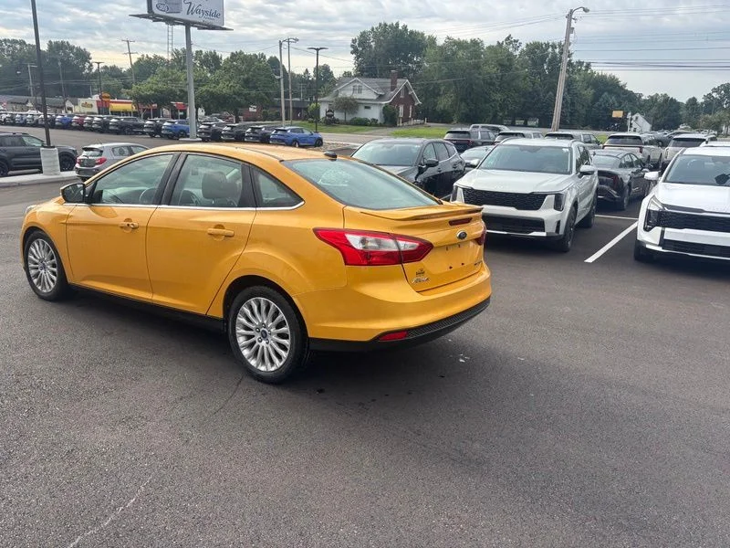 Used 2012 Yellow Ford Titanium image 6