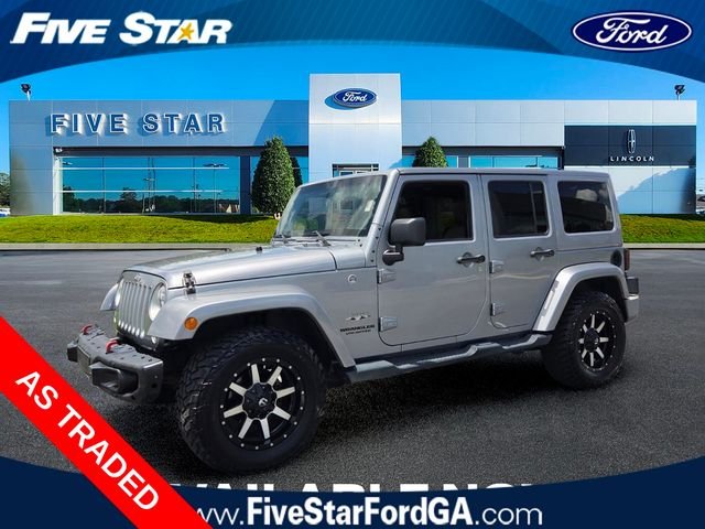 Used 2016 Silver Jeep Unlimited Sahara image 3