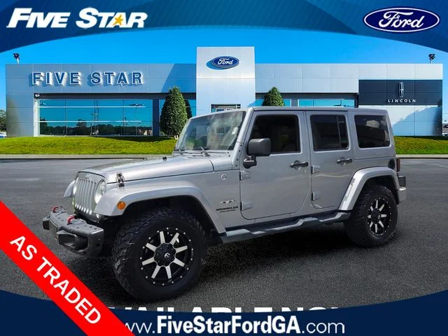 Used 2016 Silver Jeep Unlimited Sahara image 3