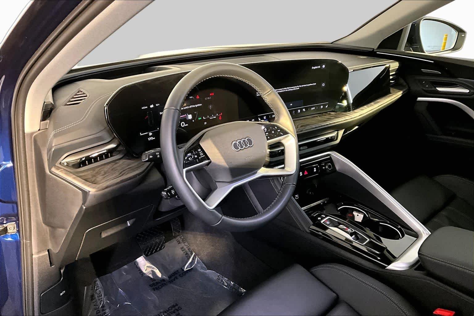 Used 2025 Navarra Blue Metallic Audi Premium Plus image 17