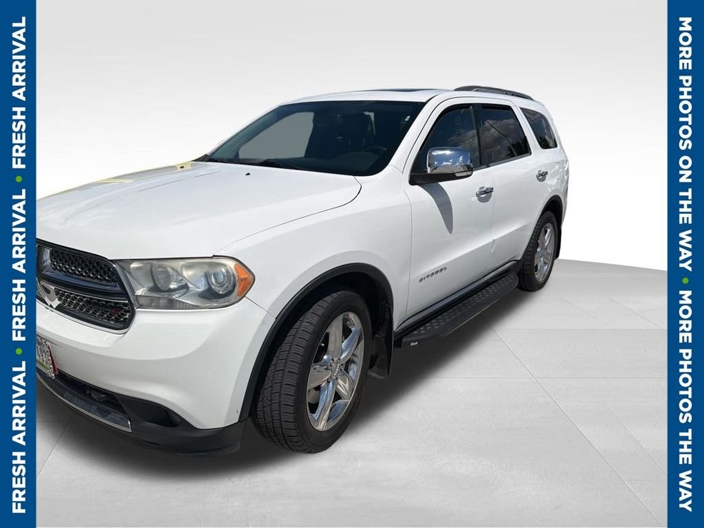 Used 2013 White Dodge Citadel image 1