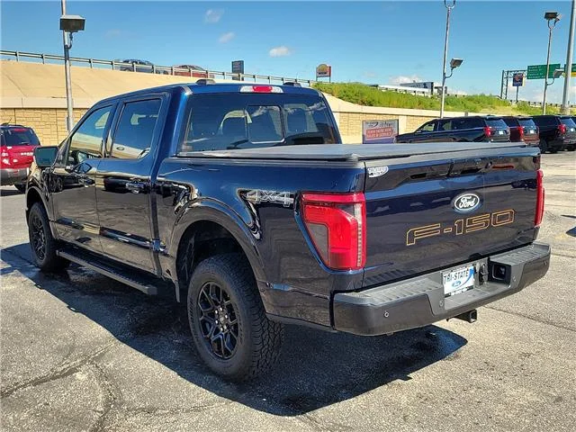 Used 2024 Blue Ford XLT 4x4 SuperCrew Cab 5.5 ft. box 145 in. WB image 3