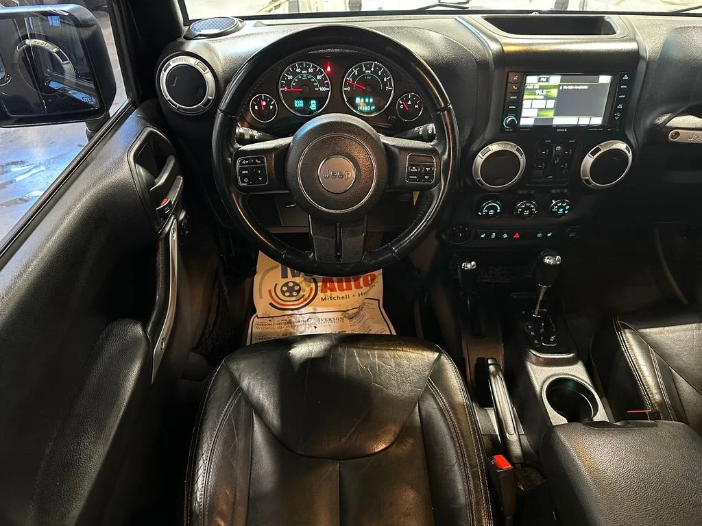 Used 2016 Black Jeep Unlimited Sahara image 24