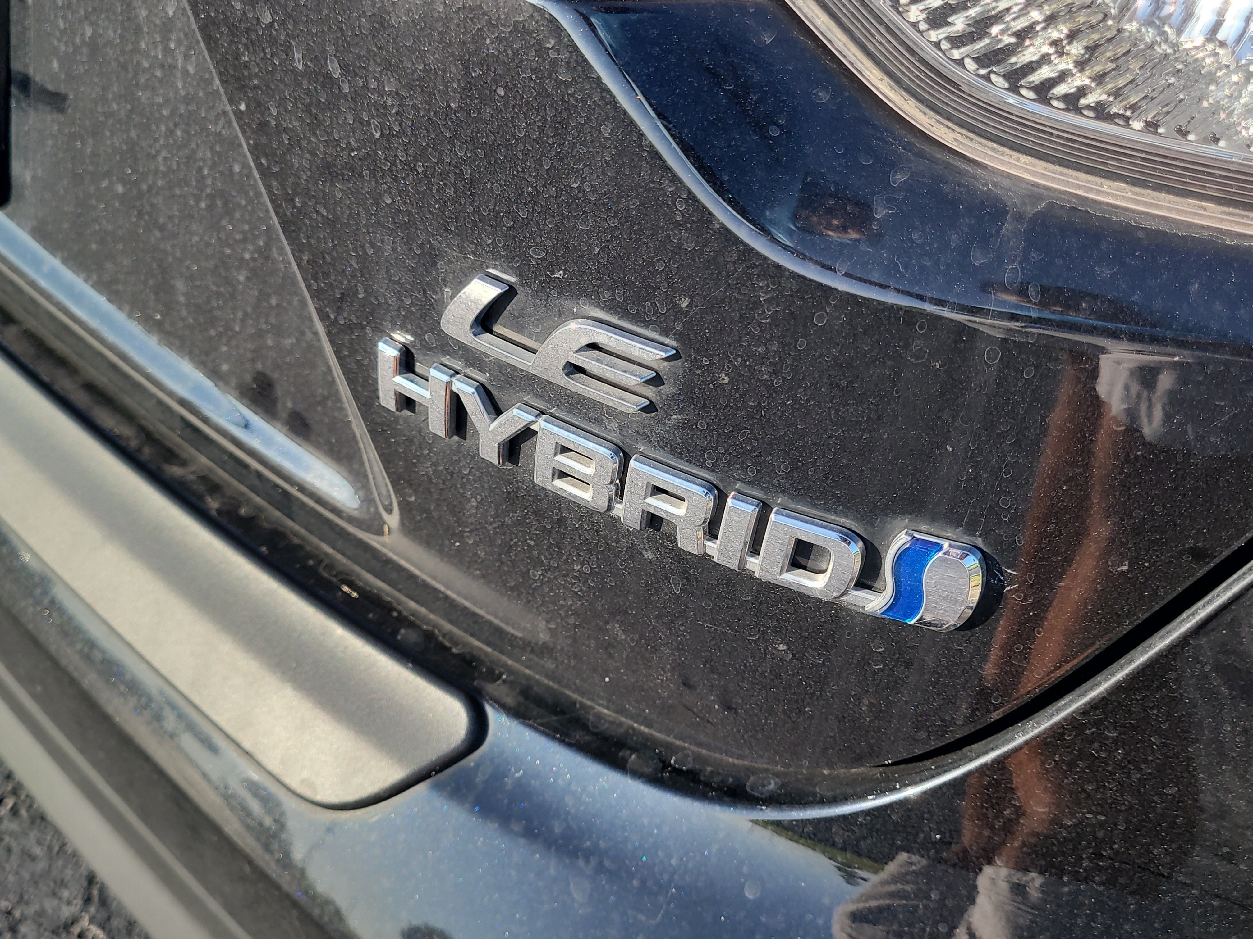 Used 2023 Midnight Black Metallic Toyota Hybrid LE image 9