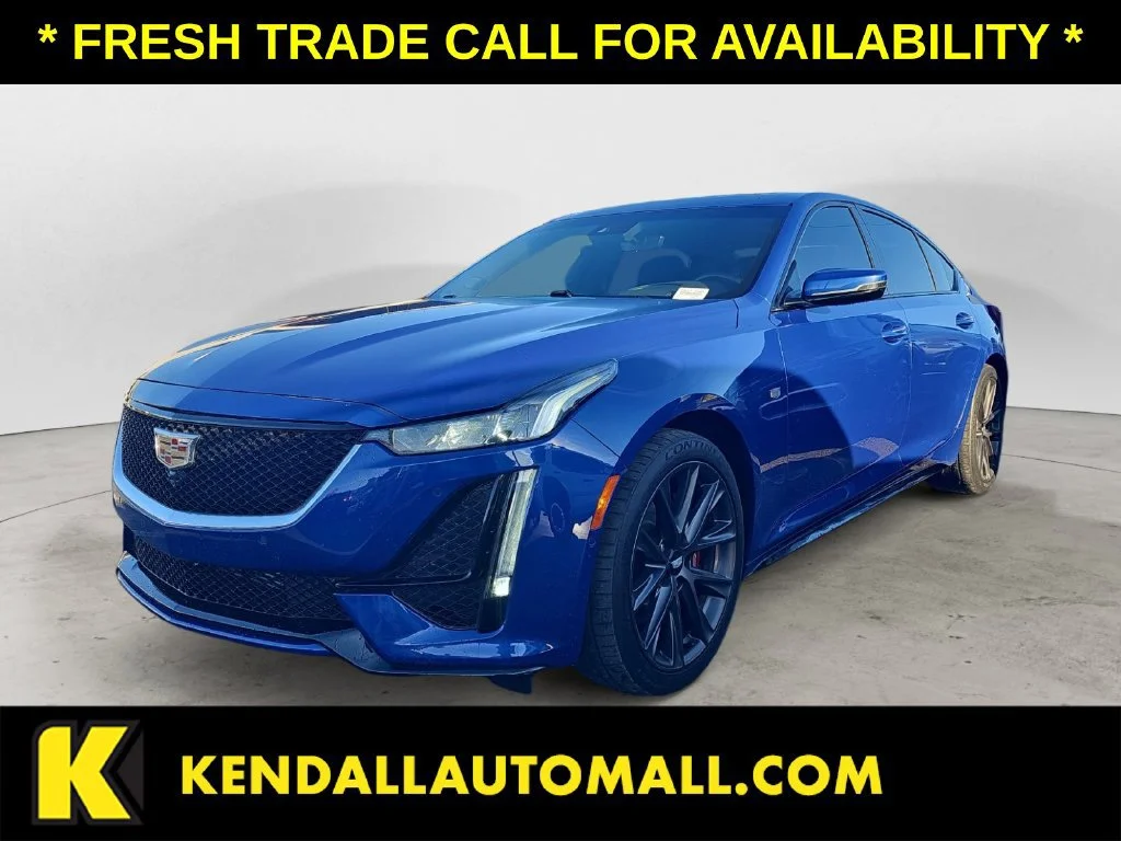 Used 2020 WAVE METALLIC Cadillac Sport image 1