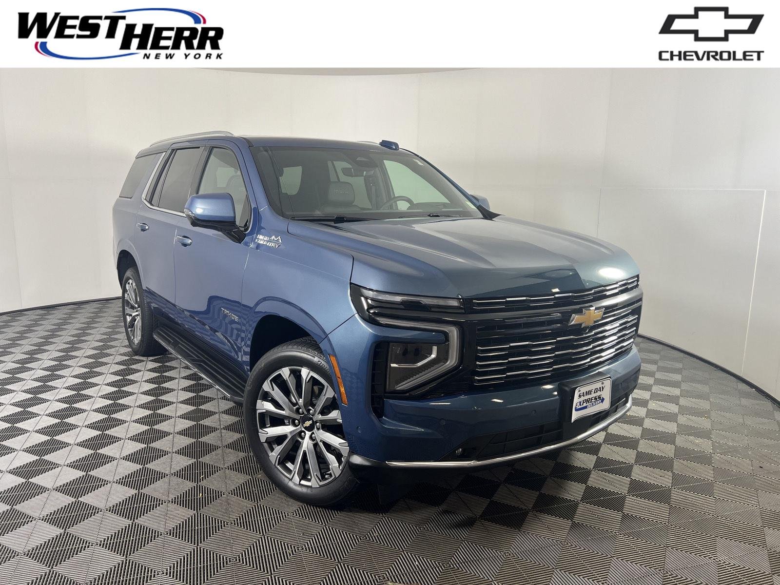 Used 2025 Lakeshore Blue Metallic Chevrolet High Country image 1