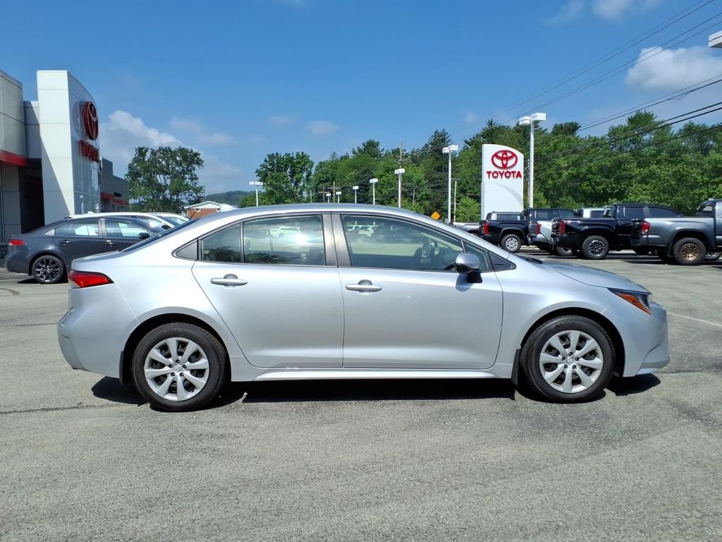 Used 2023 Classic Silver Metallic Toyota LE image 3