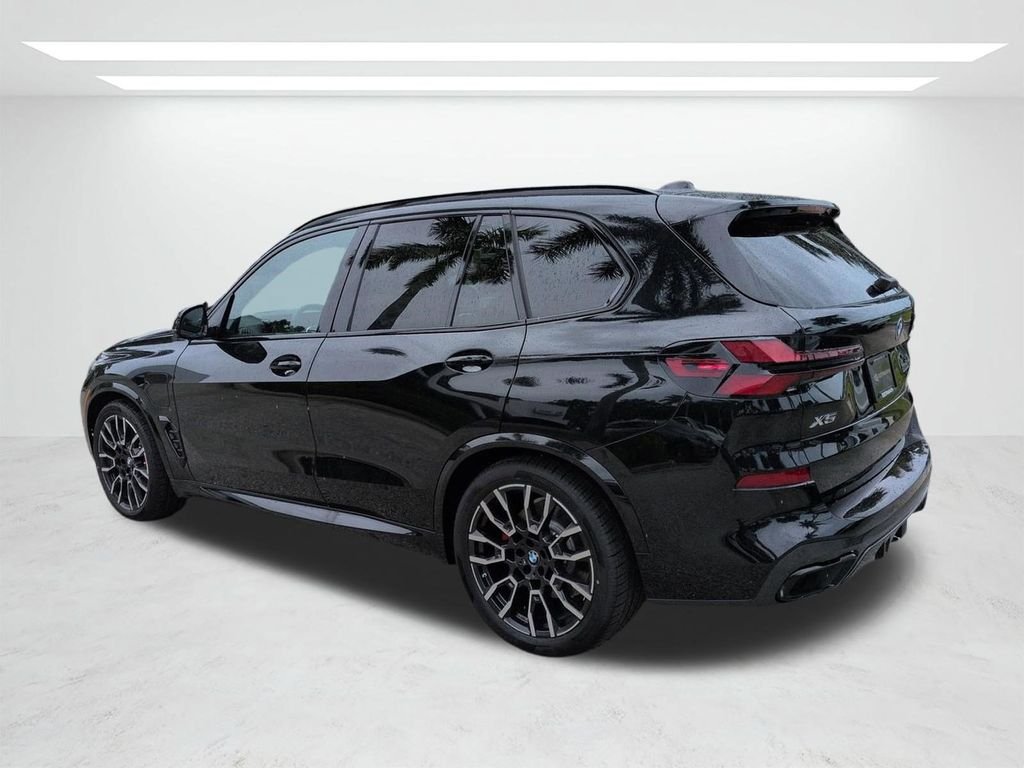 New 2026 Black Sapphire Metallic BMW xDrive50e image 6