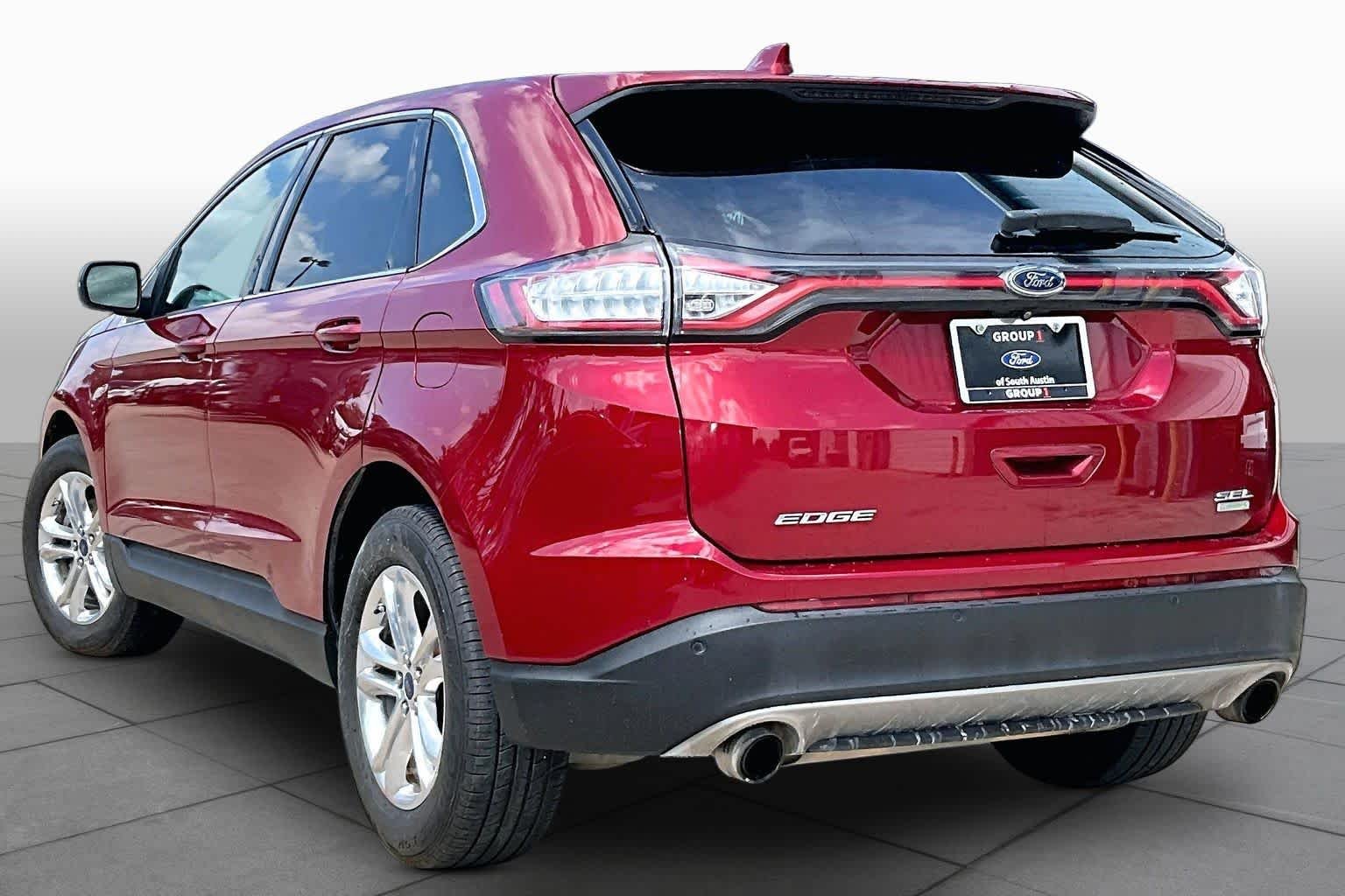 Used 2015 Ruby Red Metallic Tinted Clearcoat Ford SEL image 12