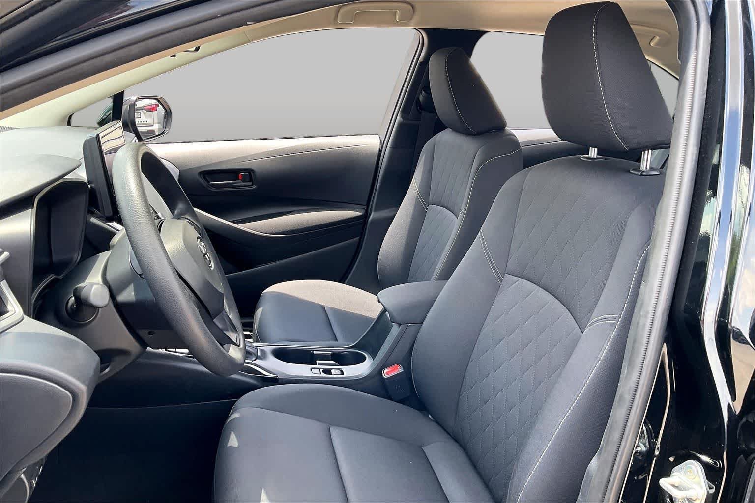 Used 2025 Midnight Black Metallic Toyota Hybrid LE image 8