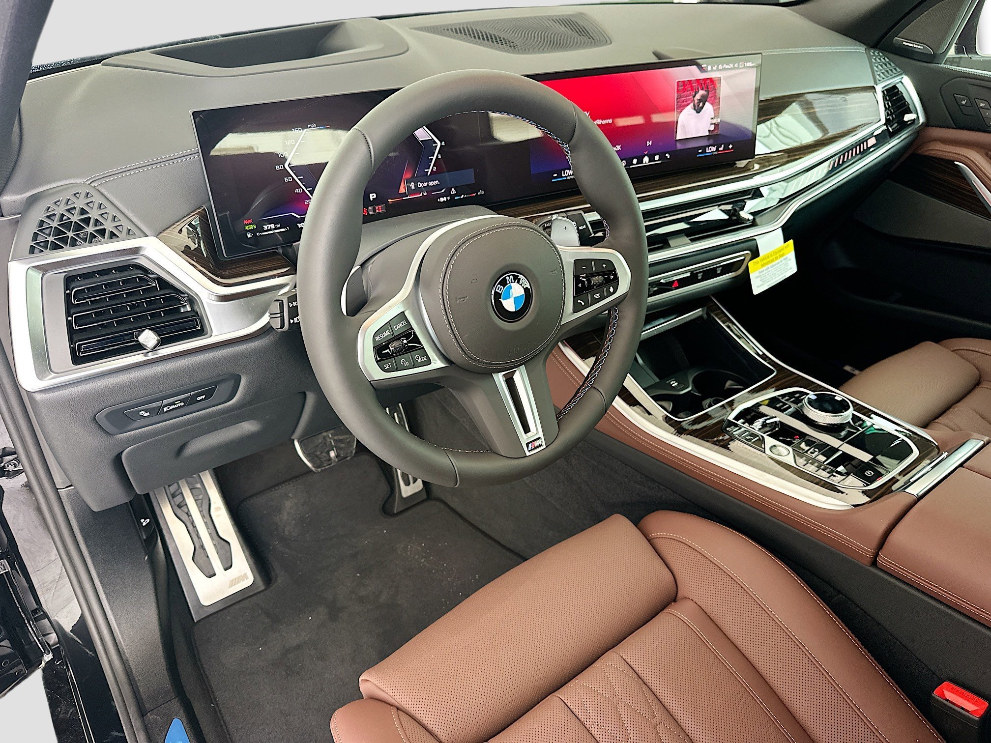 New 2026 Black Sapphire Metallic BMW M60i image 7