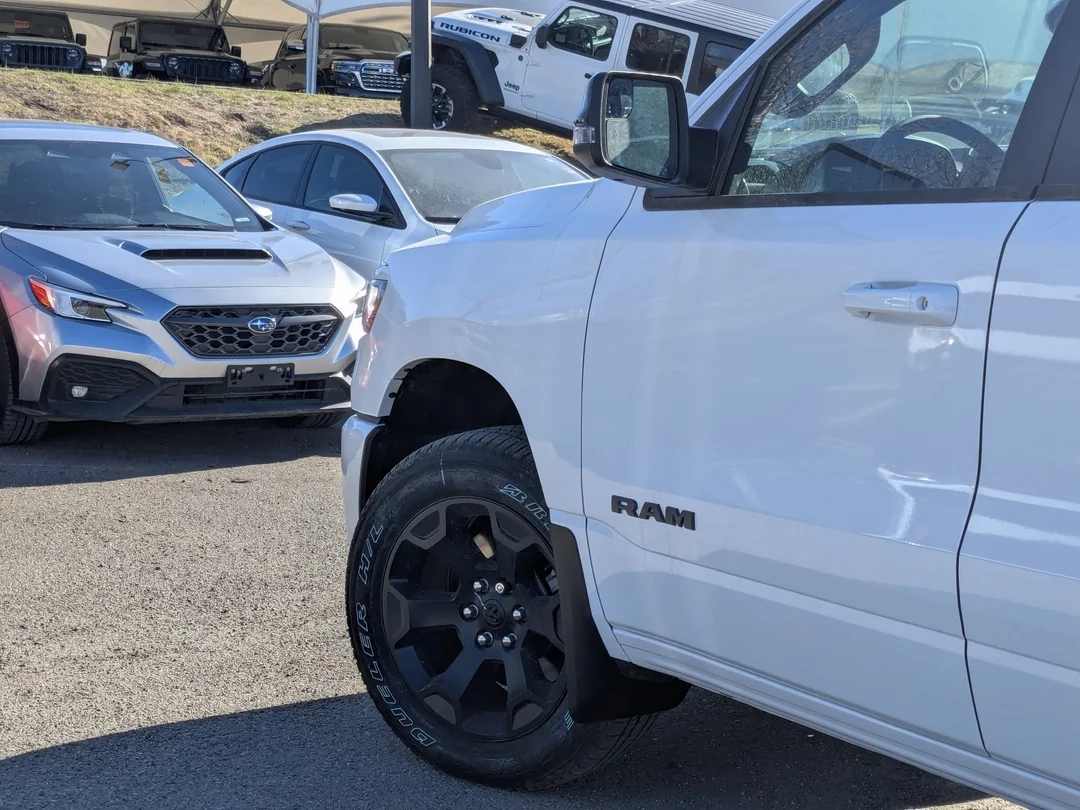 New 2026 White RAM Sport - - Sport Level 1 Equip Grp - Night Edition - 19-Spkr H/K Sound - 14.4 Uconnect Nav & More! image 9