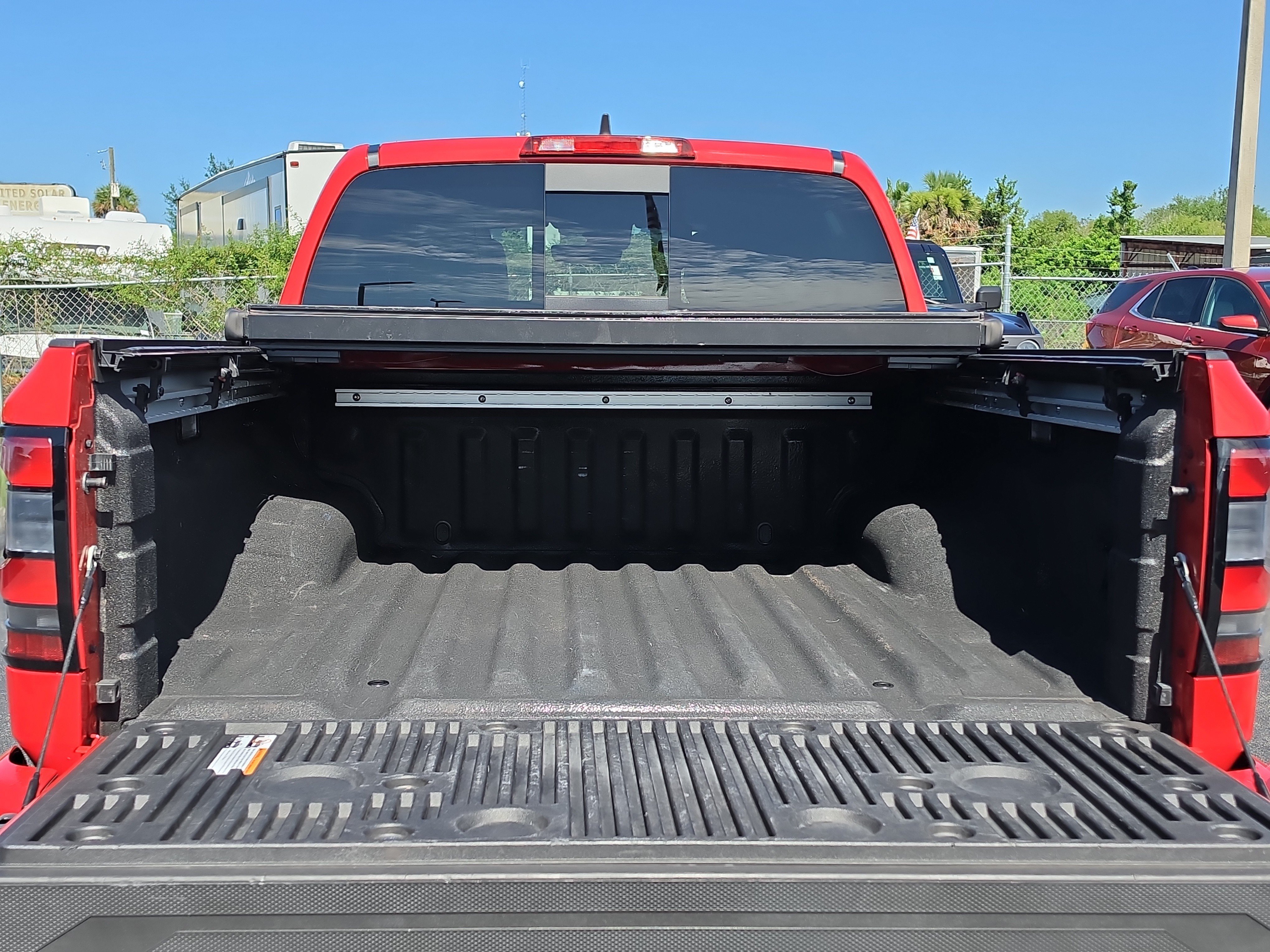 Used 2023 Red Nissan Crew Cab PRO-X 4x2 image 9