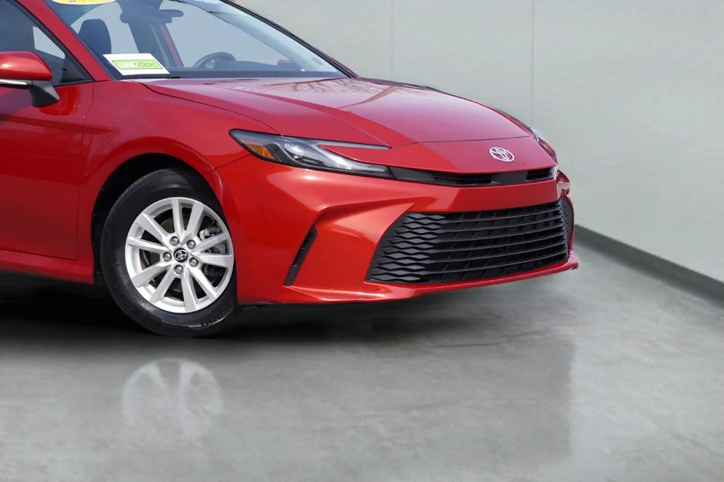 Used 2025 Supersonic Red Toyota LE image 3