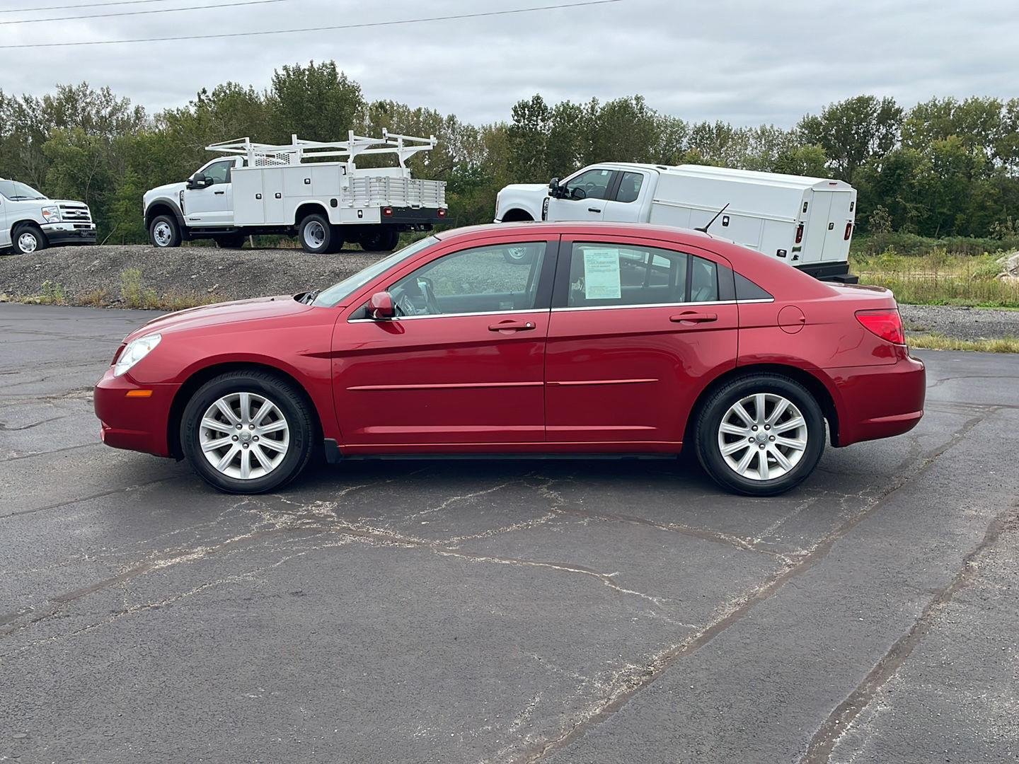 Used 2010 Inferno Red Crystal Pearl Chrysler Limited image 2