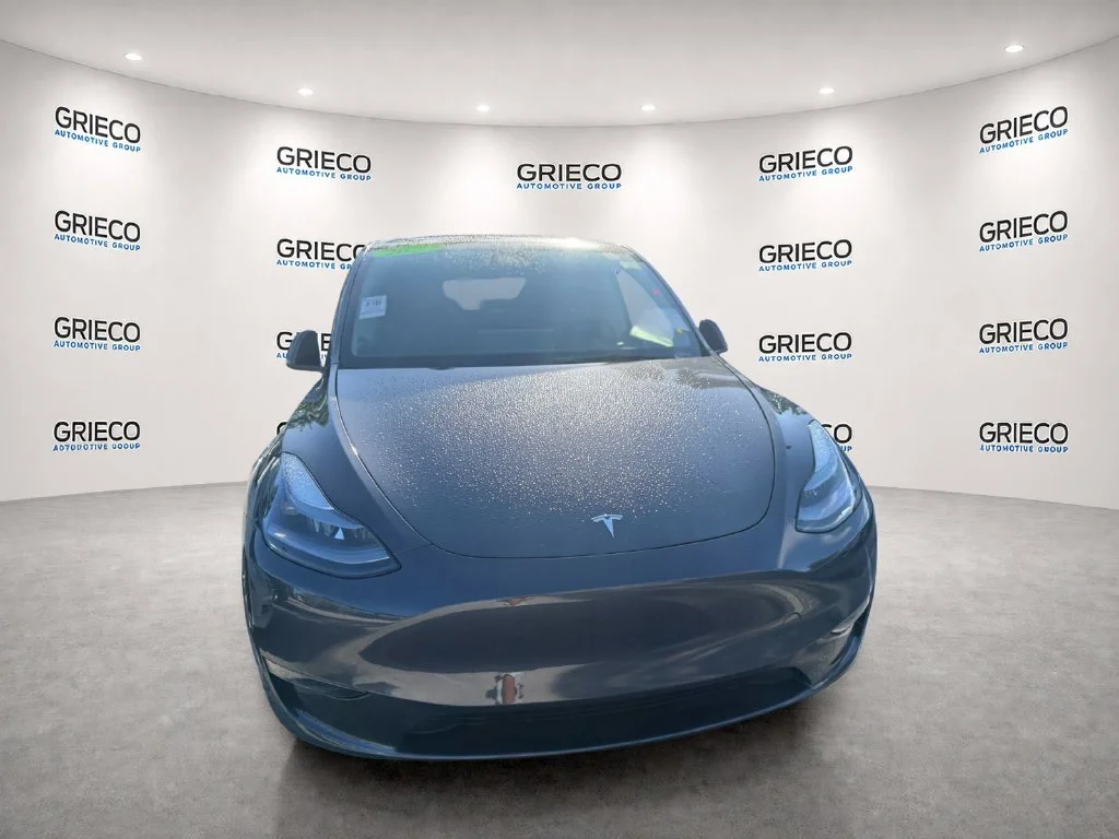 Used 2025 Tesla Model Y Long Range with VIN 7SAYGDEE8SA350670 for sale in Delray Beach, FL