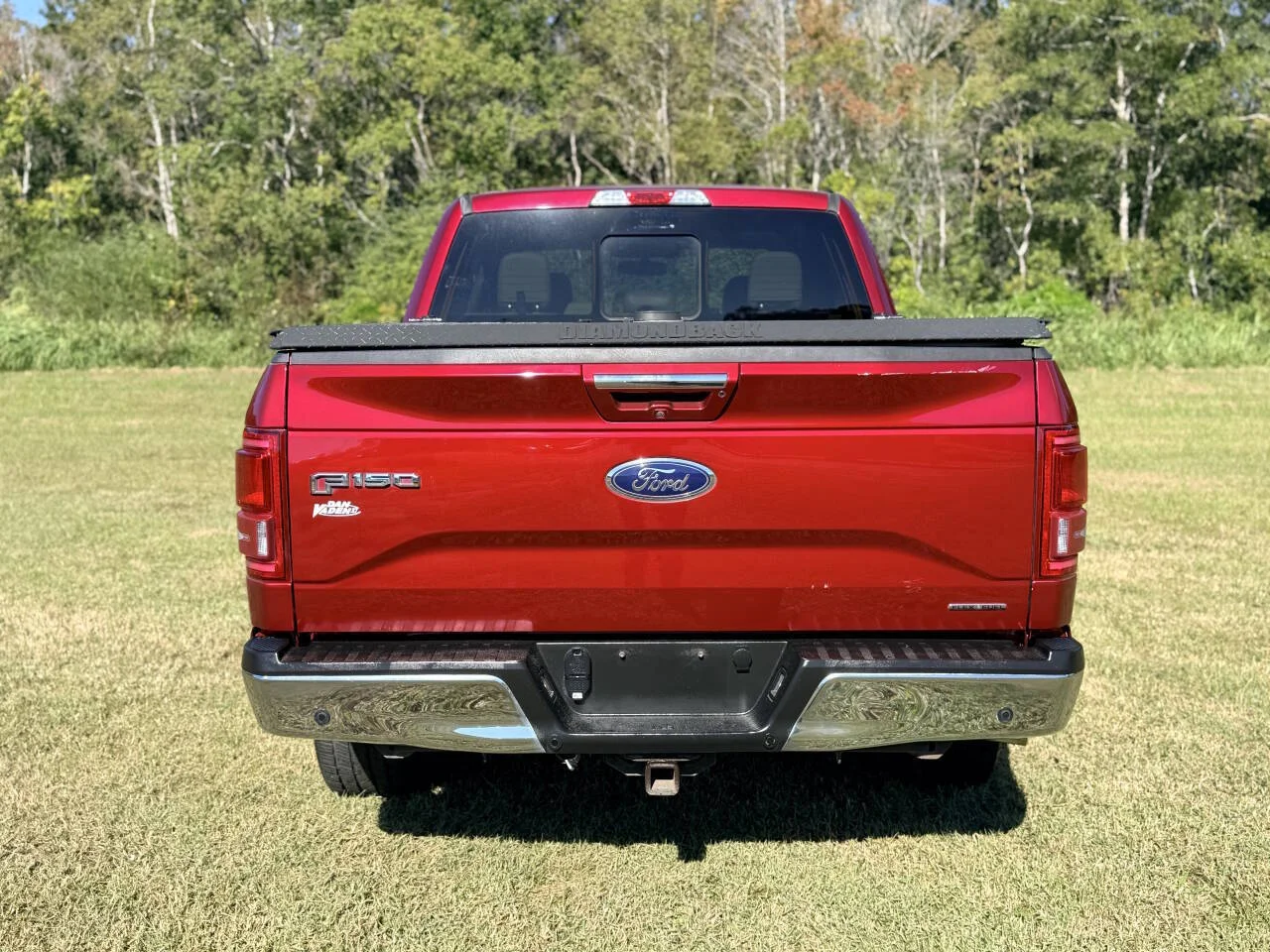 Used 2016 Red Ford Lariat 4x4 4dr SuperCrew 5.5 ft. SB image 4