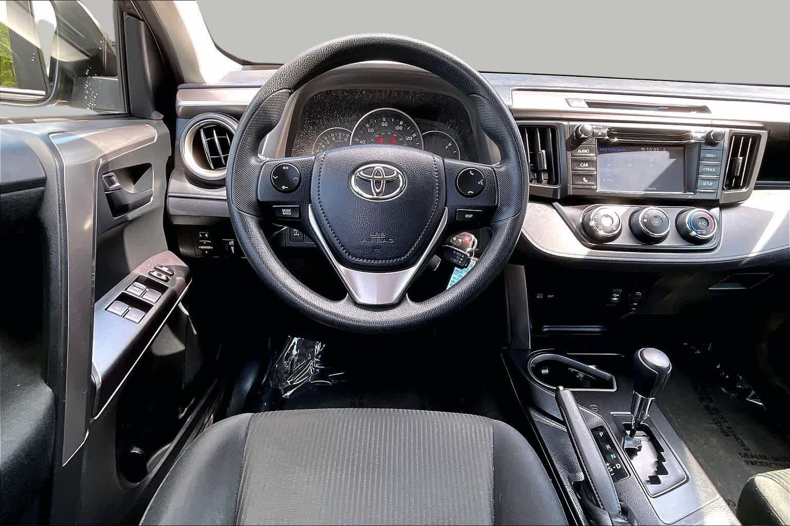 Used 2016 Magnetic Gray Metallic Toyota LE image 6