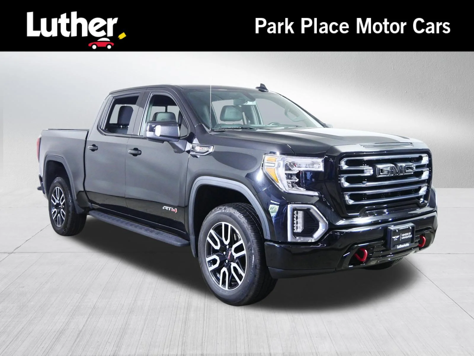 Used 2021 Ebony Twilight Metallic GMC AT4 image 1