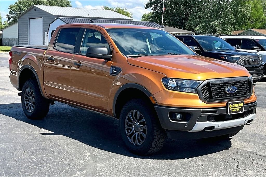 Used 2019 Yellow Ford XLT image 1