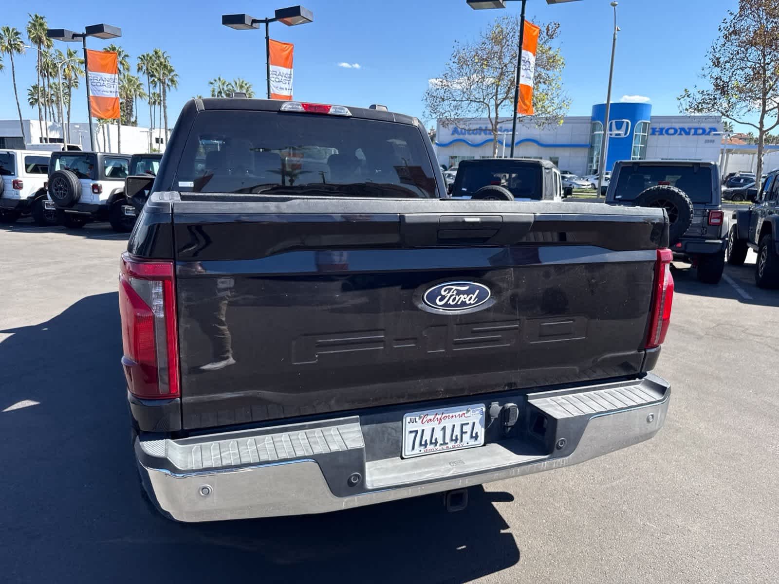 Used 2025 Agate Black Metallic Ford XLT image 13