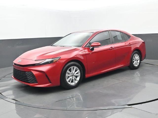 Used 2025 Supersonic Red Toyota LE image 31