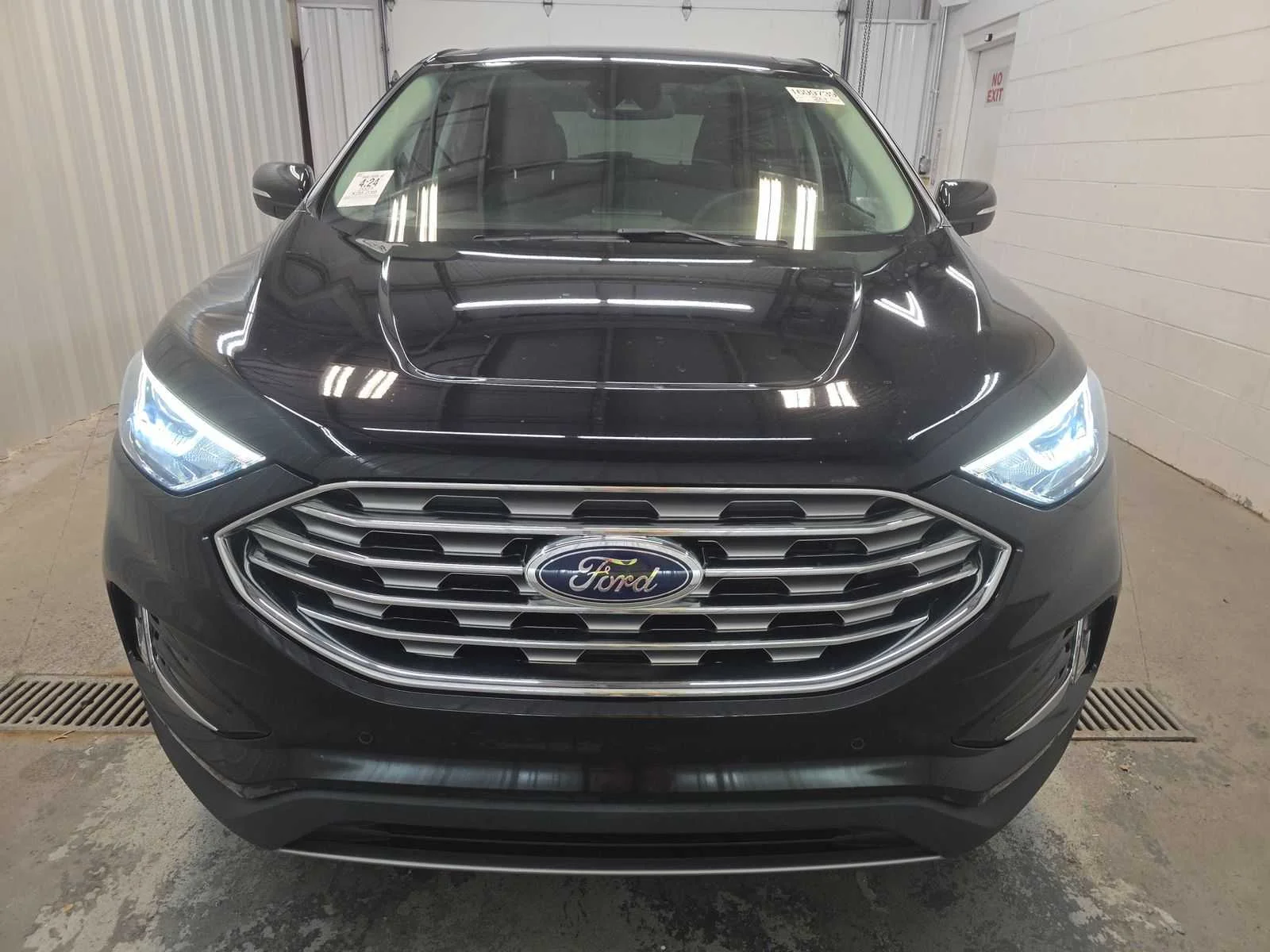 Used 2021 Agate Black Metallic Ford Titanium image 2