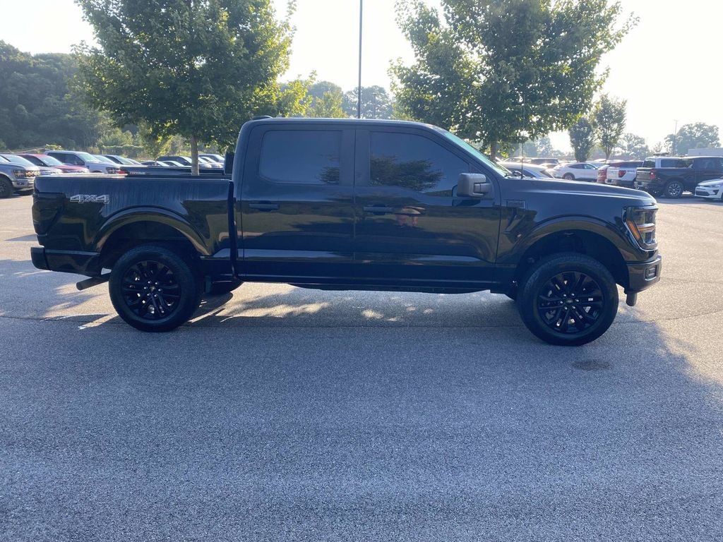 Used 2025 Agate Black Metallic Ford STX image 2