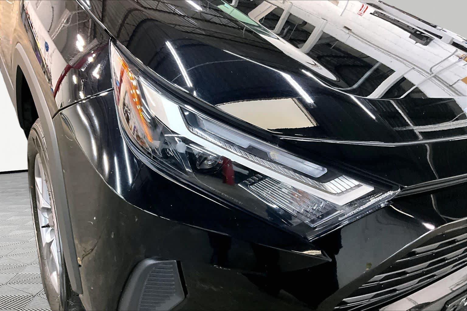 Used 2025 Midnight Black Metallic Toyota Hybrid LE image 28