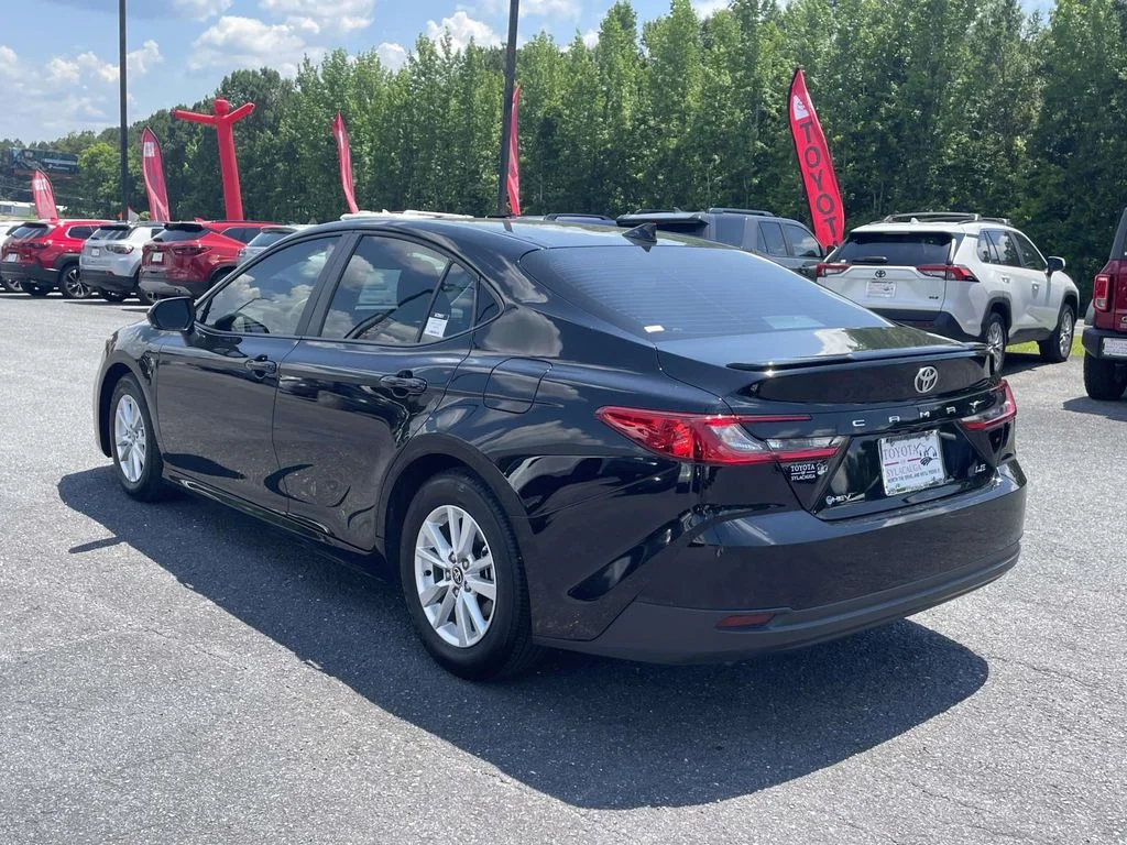Used 2025 Midnight Black Metallic Toyota LE image 4