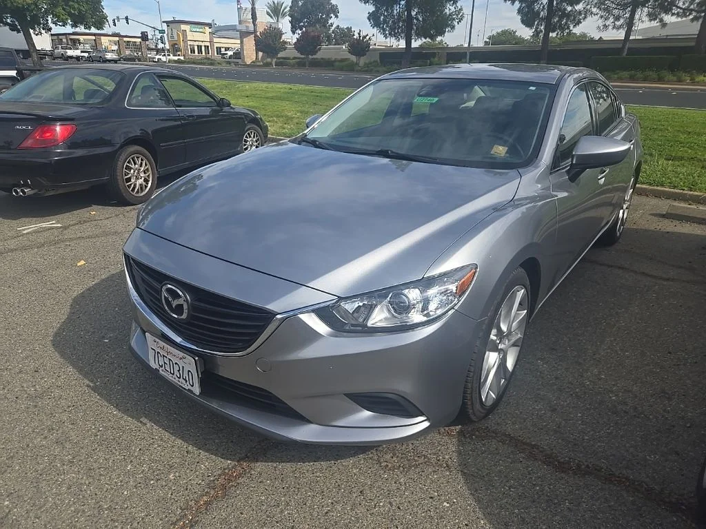 Used 2014 Liquid Silver Metallic Mazda i Touring image 1