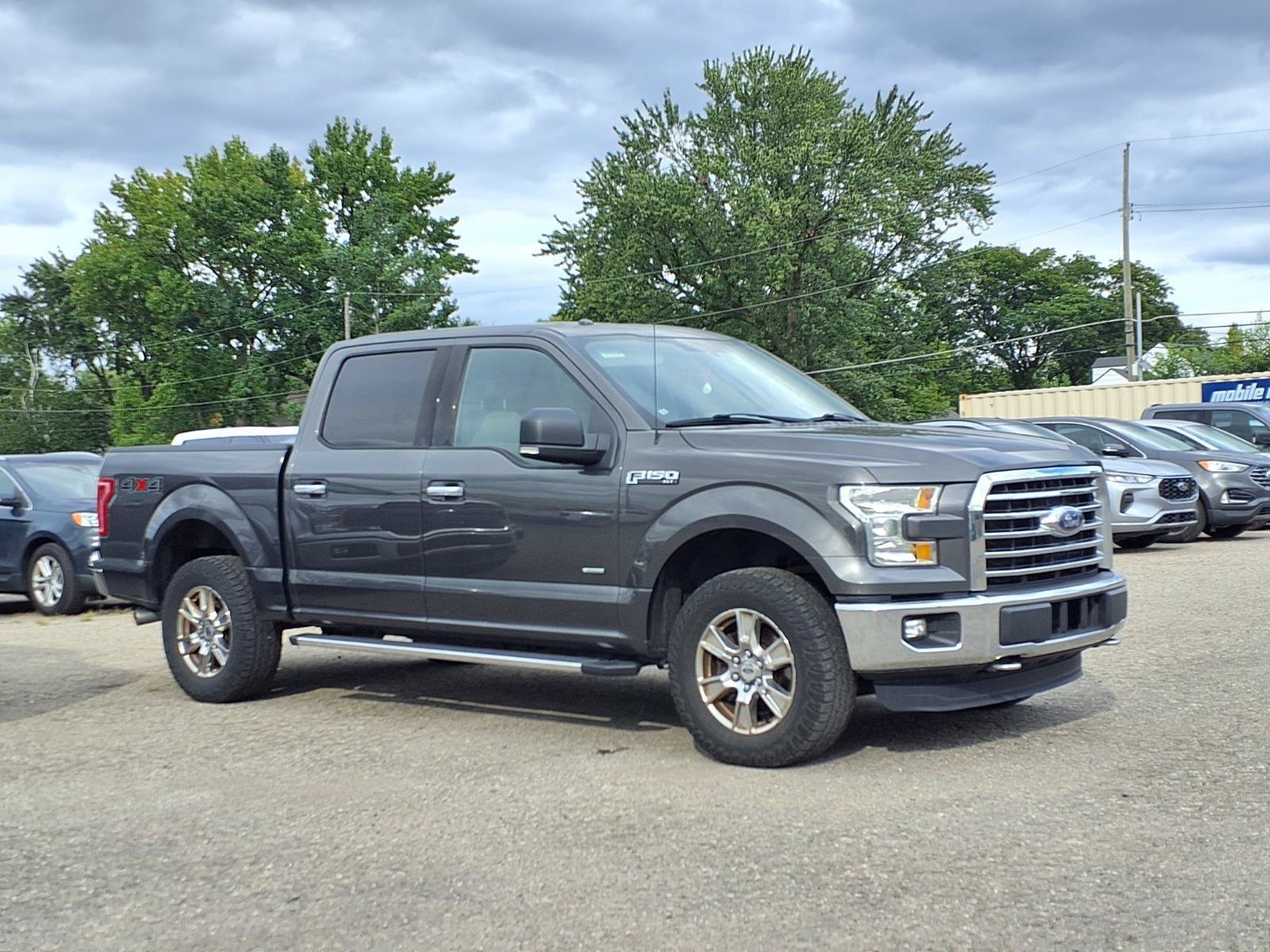 Used 2015 Magnetic Metallic Ford XLT image 1