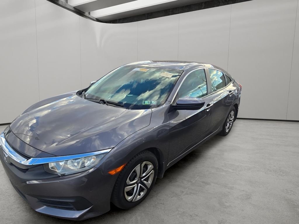 Used 2018 Honda Civic LX with VIN 2HGFC2F57JH502308 for sale in Loveland, CO