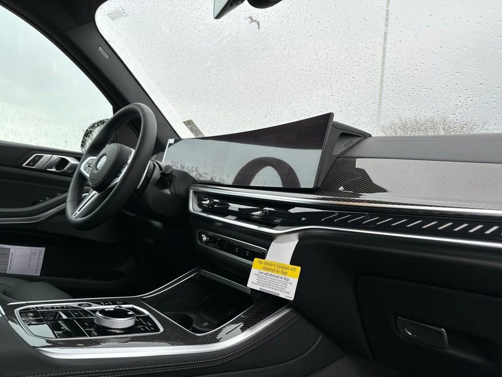 New 2026 Black Sapphire Metallic BMW M60i image 24