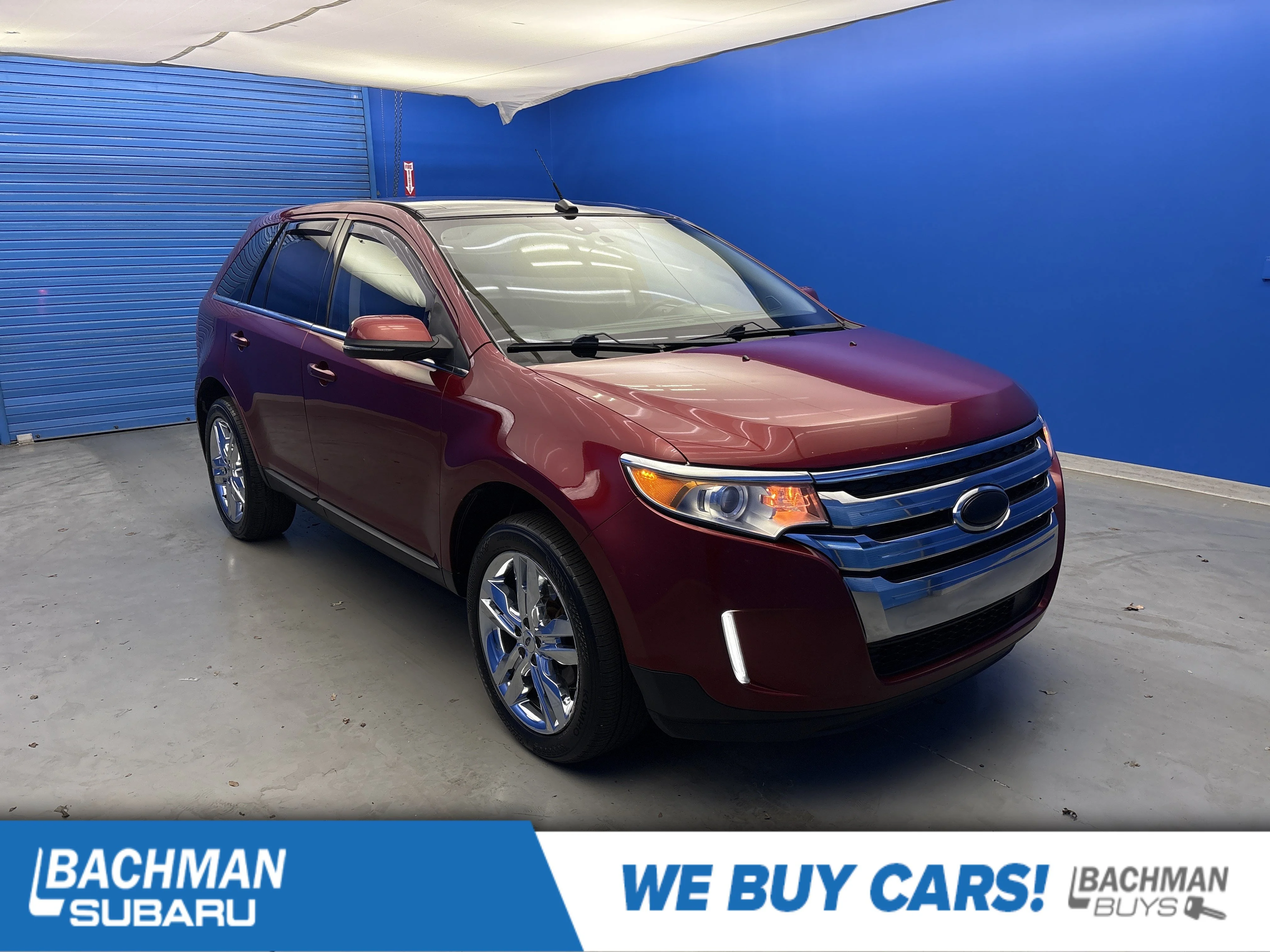 Used 2013 Ruby Red Metallic Ford Limited image 1