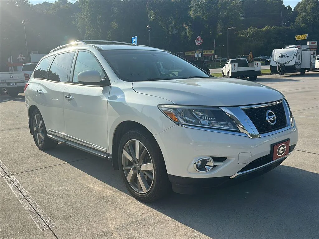 Used 2015 Pearl Nissan Platinum image 1
