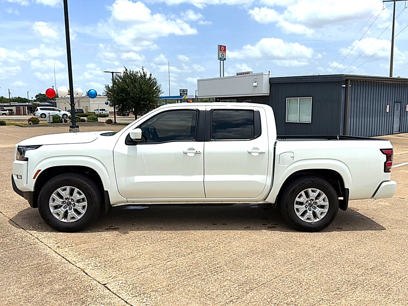 Used 2024 Glacier White Nissan Crew Cab SV 4x2 image 2