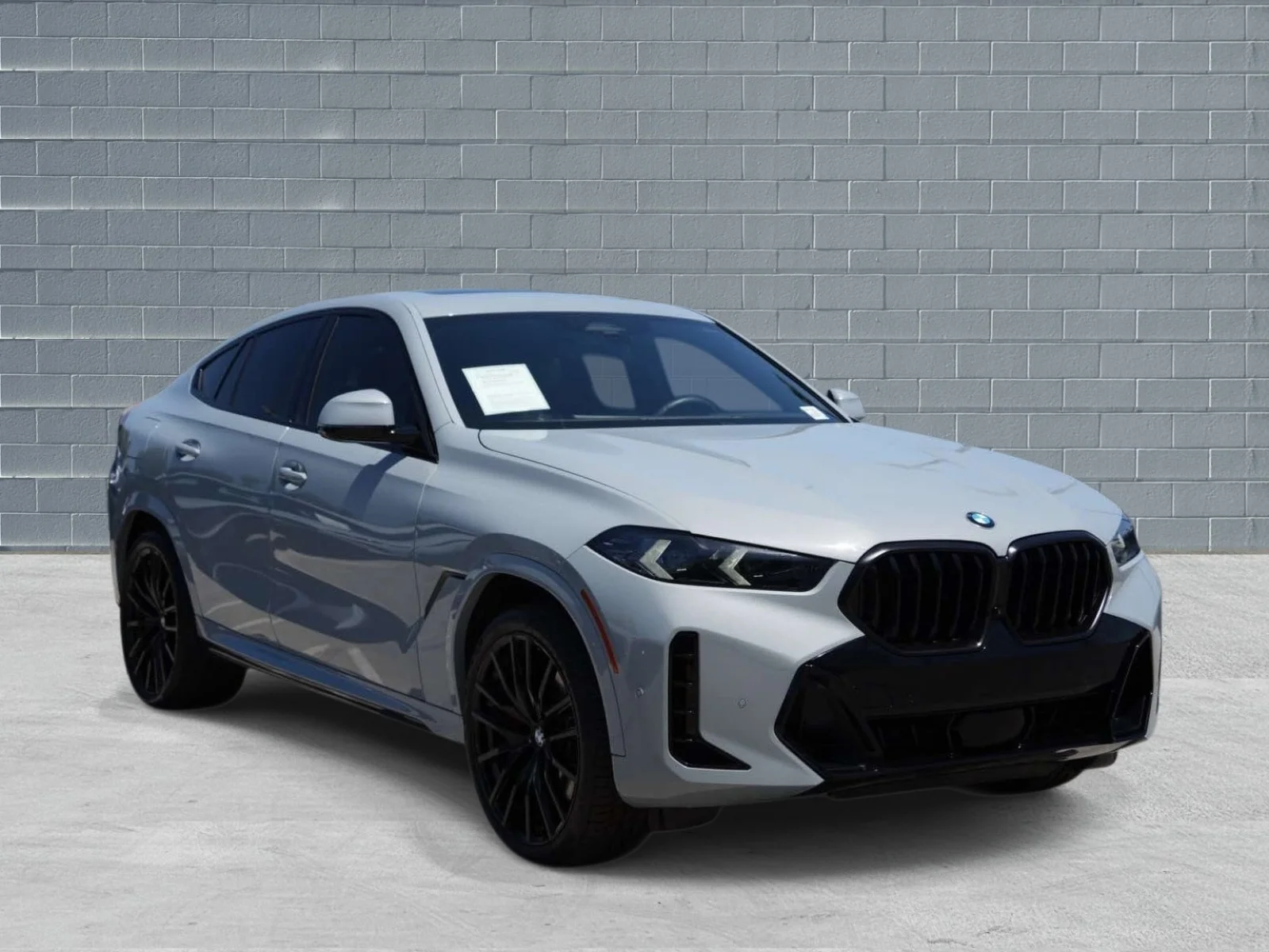 Certified Used 2025 Brooklyn Grey Metallic BMW xDrive40i Sports Activity Coupe image 1