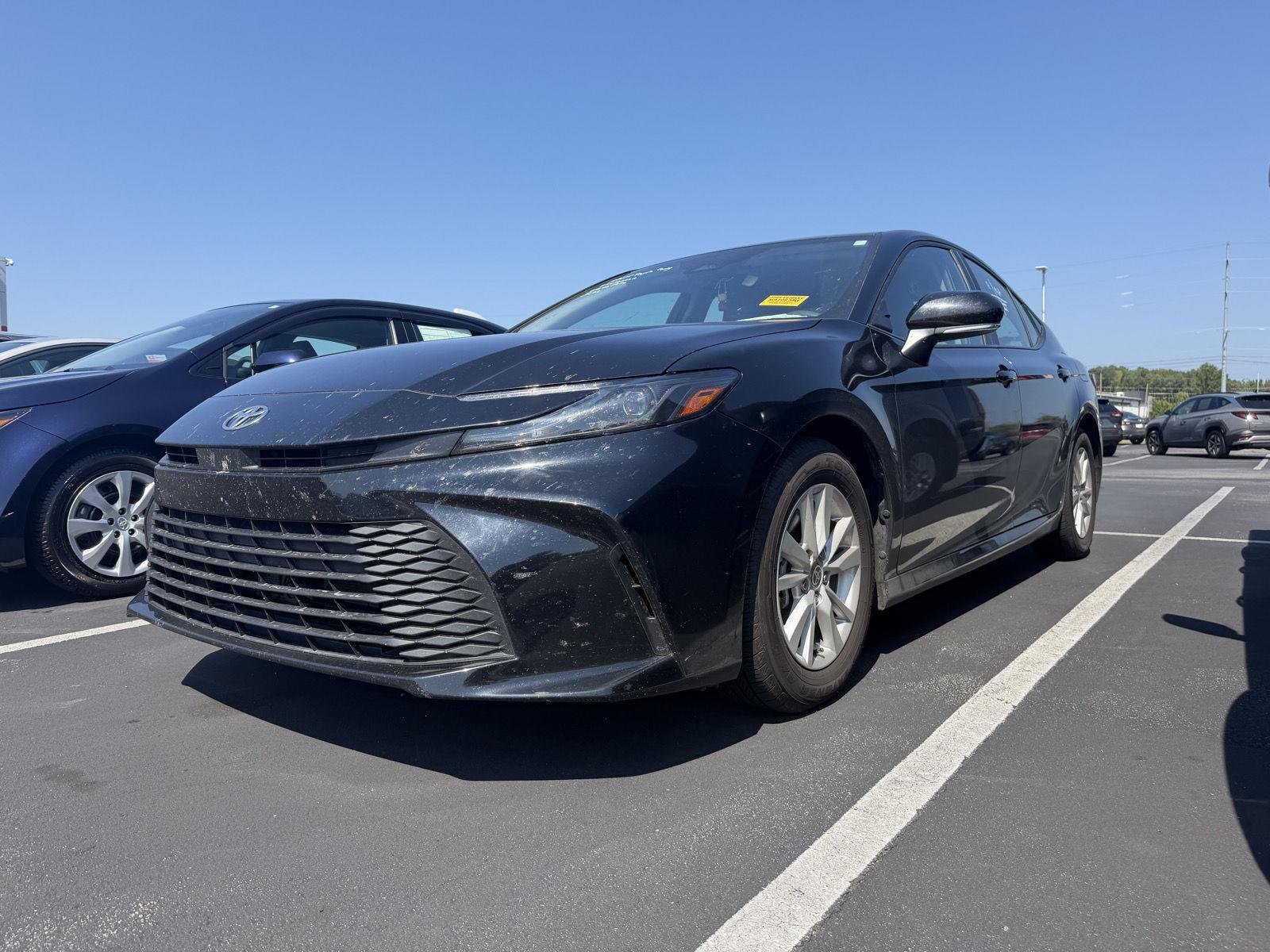 Used 2025 Midnight Black Metallic Toyota LE image 13