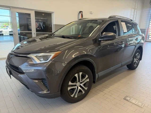 Used 2017 Gray Toyota LE image 1