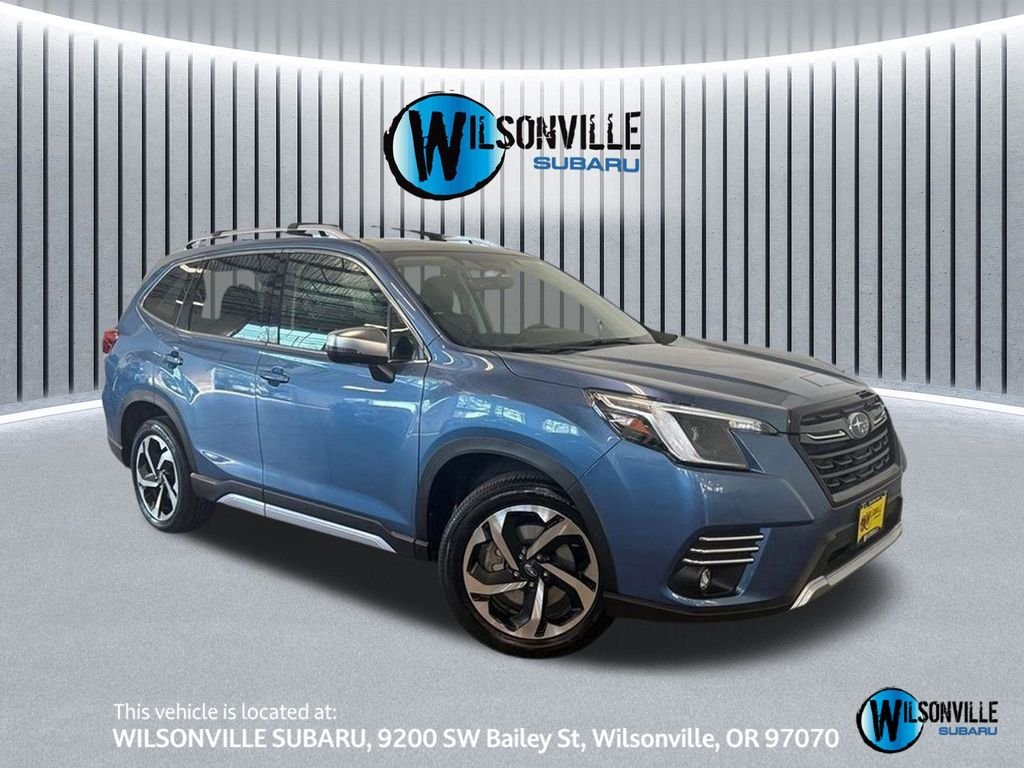 Certified Used 2023 Blue Subaru Touring image 1