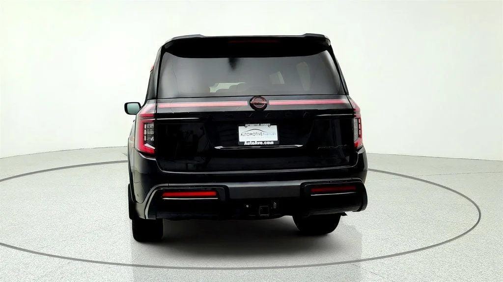 Used 2025 Super Black Nissan 4x4 PRO-4X w/ Cross Bars image 6