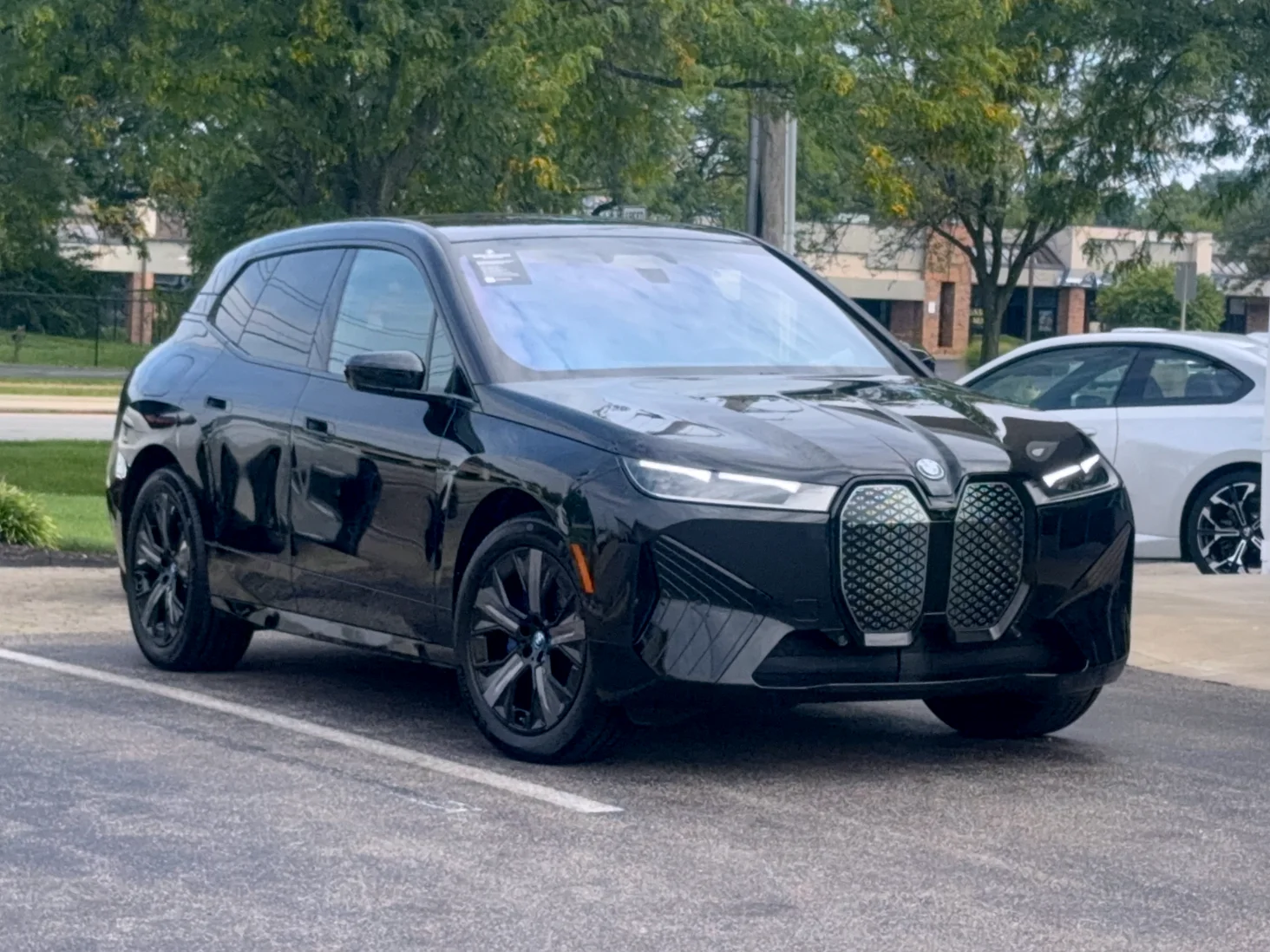Certified Used 2024 Black Sapphire Metallic BMW xDrive50 image 1