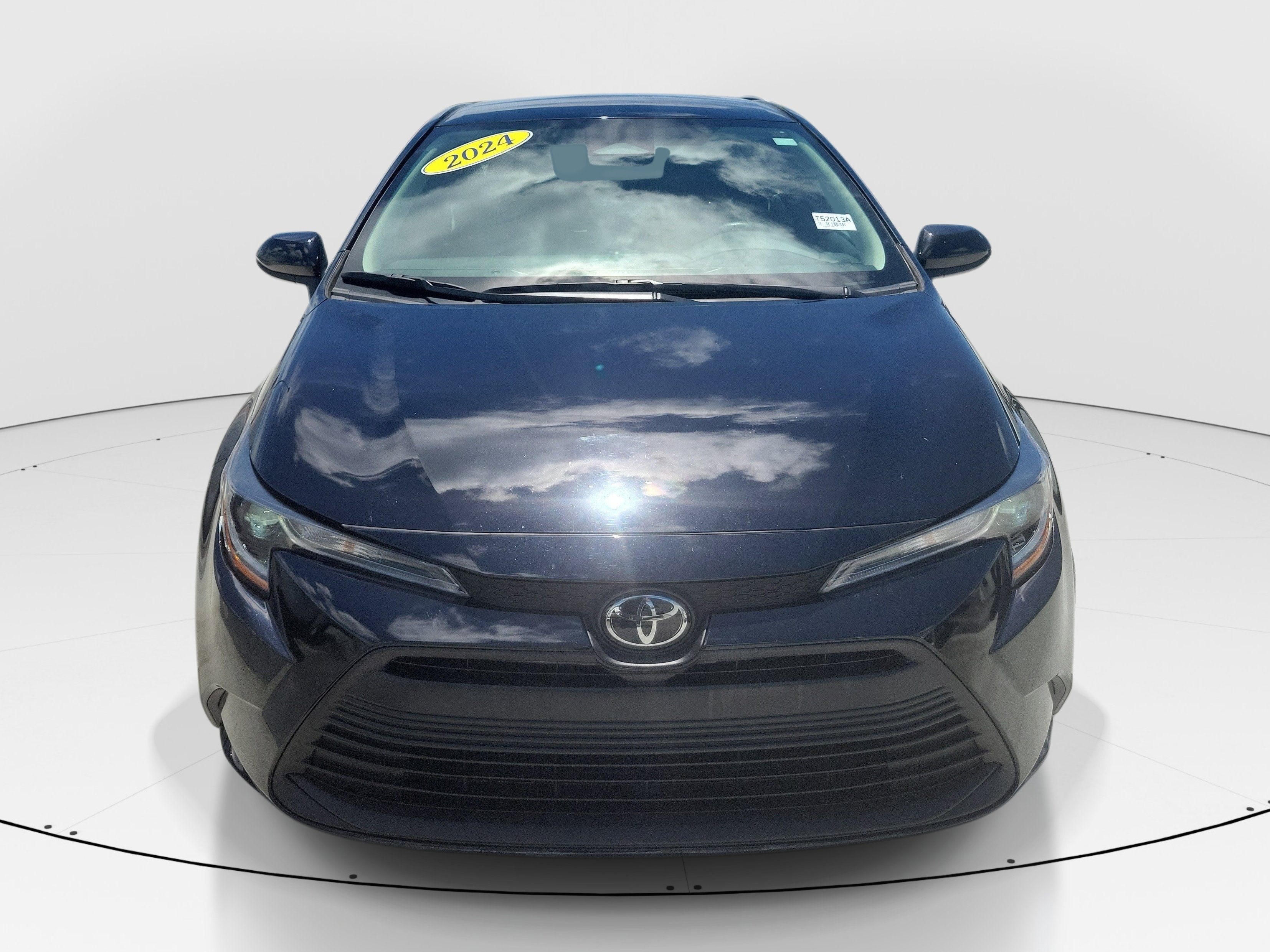 Used 2024 Midnight Black Metallic Toyota LE image 2