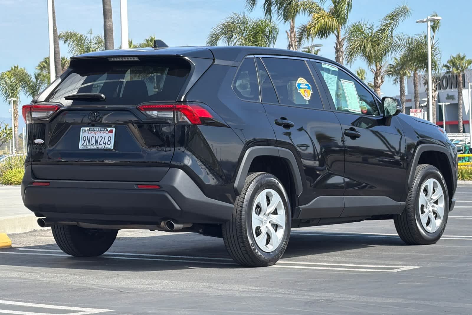 Used 2024 Midnight Black Metallic Toyota LE image 4